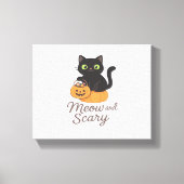 Ondeugende zwarte kat met gloeiende groene ogen op canvas afdruk (Voorkant)