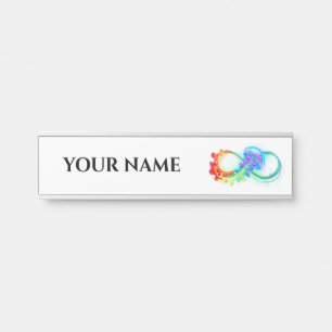 Oneindigheid met regenboogkwal deurbordje