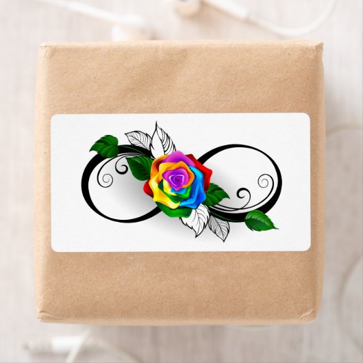 Oneindigheidssymbool met regenboogroos etiket (Insitu)