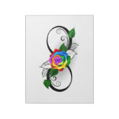 Oneindigheidssymbool met regenboogroos notitieblok (Gedraaid)