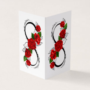 Oneindigheidssymbool met rode rozen visitekaartjes