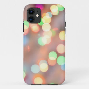 Onscherp beeld van verlichte kerstverlichting iPhone 11 Hoesje