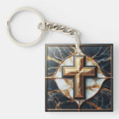 Onthulde zwart-wit marmeren kruis met goud sleutelhanger (Voorkant)