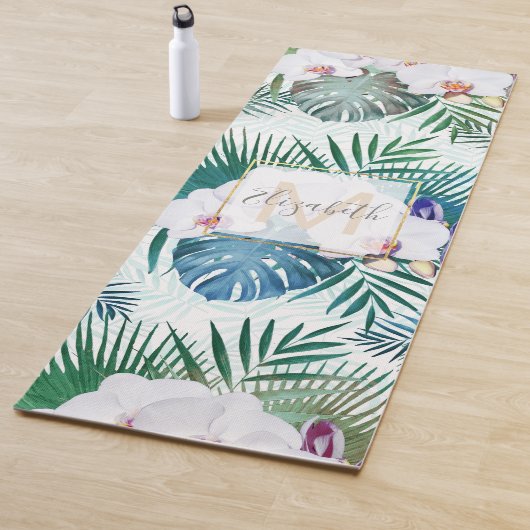 Ontwerp van tropische bladeren en orchidebloemen yogamat (In situ)