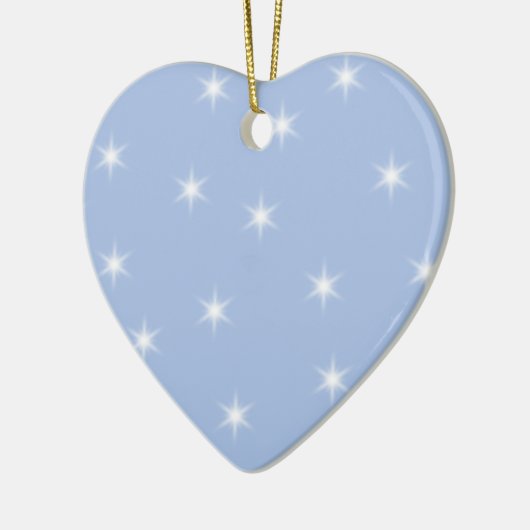 Ontwerp van witte en blauwe sterren. keramisch ornament (Links)