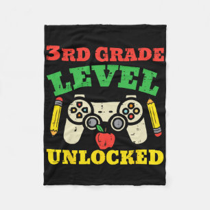 Onvergrendelde videogame op 3e-klasseniveau, eerst fleece deken