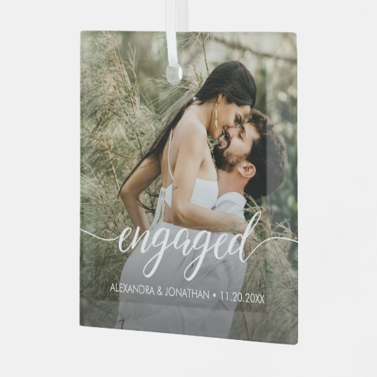 Onze eerste kerstcadeaufotonamen glas ornament (Voorkant links)