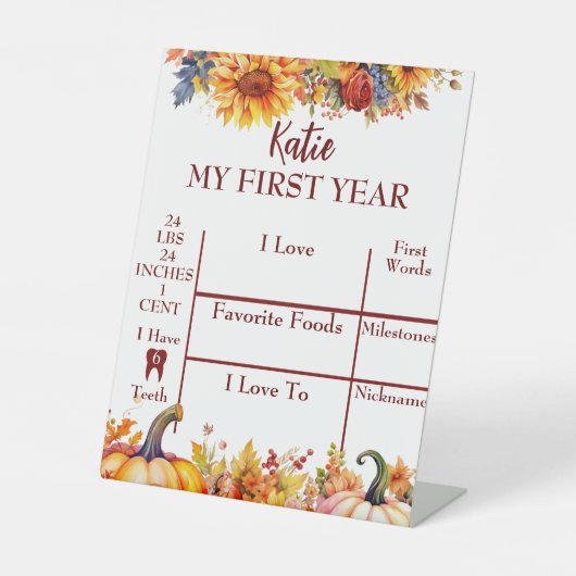 Onze kleine pompoen wordt een jaar reclamebord met voetstuk