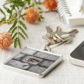 "Oog achter de muur" Sleutelhanger (Zijkant)