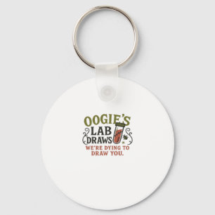 Oogie�s Lab Trekt � Grappige Halloween-flebotomist Sleutelhanger