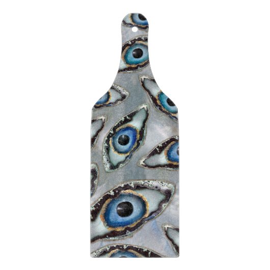 Oogschilfers en kristallen op parels snijplank (Voorkant)