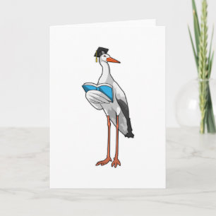 Ooievaar als leraar met boek kaart