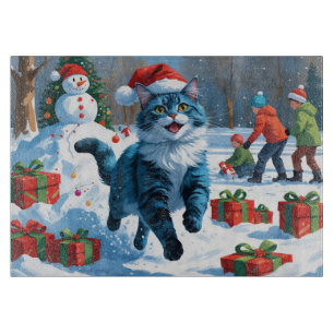 Oosterse blauwe kat zit in sneeuw kersthoed snijplank