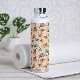 Op de door de wind getossde bloemenkiezels-verre d waterfles