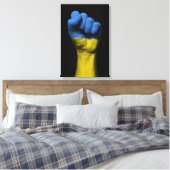 Opgeheven gebalde vuist met Oekraïense vlag Canvas Afdruk (Insitu (Slaapkamer))