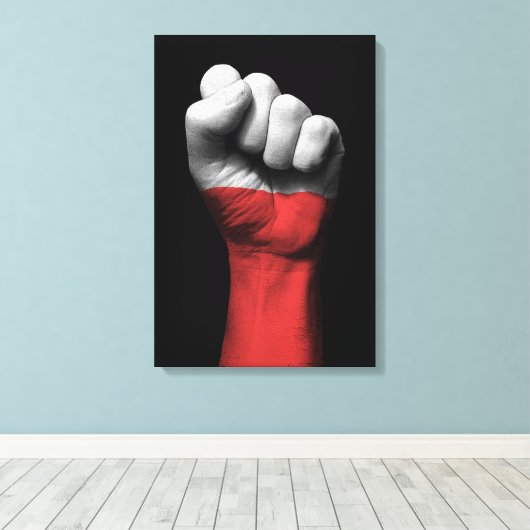Opgeheven gebalde vuist met Poolse vlag Canvas Afdruk (Insitu (Houten vloer))