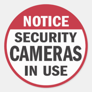 Opmerking: Beveiligingscamera's in gebruik sticker