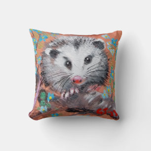Opossum et fleurs lancent des oreillers