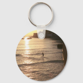 Opstaan tegen de zonsondergang van San Sebastian Sleutelhanger