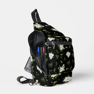 Opvallend wit-groen bloempatroon op zwart sling bag