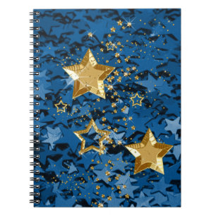 Or et carnet de notes à spirale d'étoiles bleues