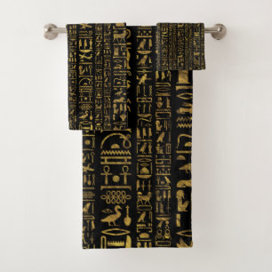 Or vintage d'hiéroglyphes égyptiens sur le noir