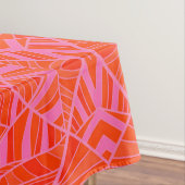 Orange sur la nappe géométrique rose de motif par (In Situ)