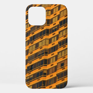Oranje betongebouw iPhone 12 hoesje