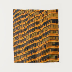 Oranje betongebouw wandkleed