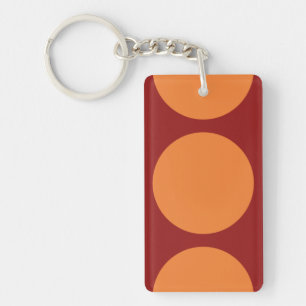 Oranje cirkels op rood sleutelhanger