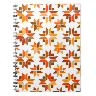 Oranje en bladerend kantelpatroon notitieboek