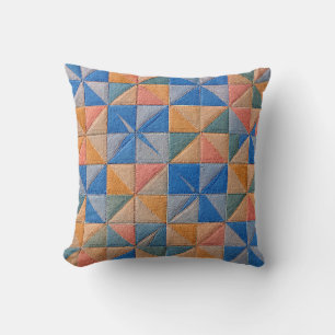 oranje en blauwe quilt kussen