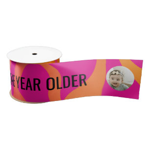 Oranje en hete roze gradiënt een jaar ouder lint