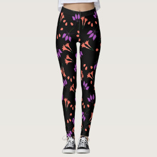 Oranje en paarse bloemmotief op zwart leggings