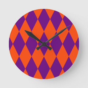 Oranje en paarse harlekijn geruit ontwerp ronde klok
