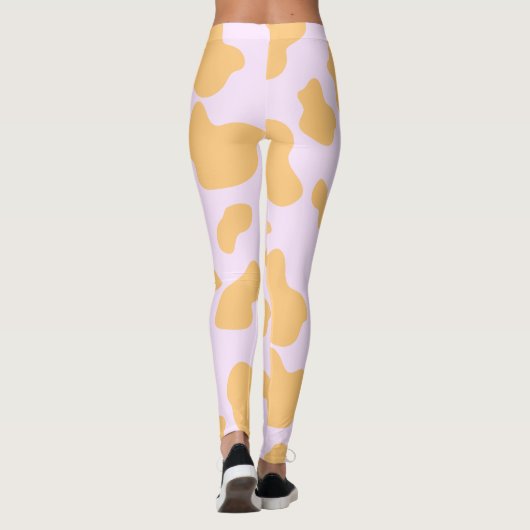 Oranje en roze Koe Print esthetiek Leggings (Achterkant)