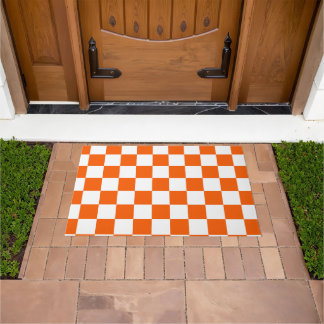 Oranje en wit dambordpatroon deurmat