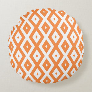 Oranje en wit diamantpatroon rond kussen