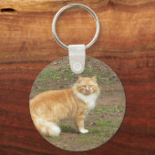 Oranje en witte drijfmest sleutelhanger (Voorkant)