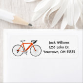 oranje fiets op wit etiket (Insitu)