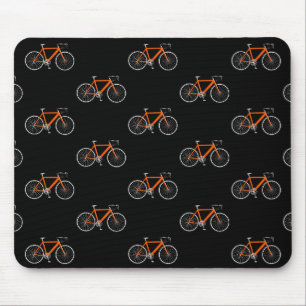 oranje fiets op zwart muismat