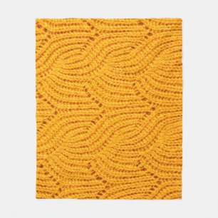 Oranje gebreide trui, gestructureerde achtergrond. fleece deken