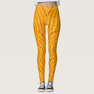 Oranje gebreide trui, gestructureerde achtergrond. leggings