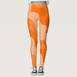 Oranje golvende oceaangolven gradiënt leggings