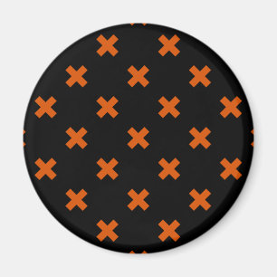 Oranje kruisstiften op zwart magneet