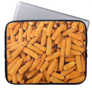 Oranje maïskolf: oogstlandbouw achtergrond laptop sleeve