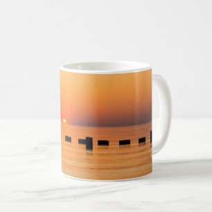 Oranje meer zonsopgang koffiemok