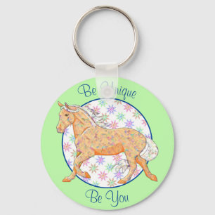 Oranje palominopaard (roze/groen) sleutelhanger