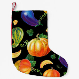 Oranje pompoen, gestreept zucchini, blauwe eierpla kleine kerstsok