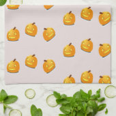 Oranje pompoenkoppatroon theedoek (Gevouwen)